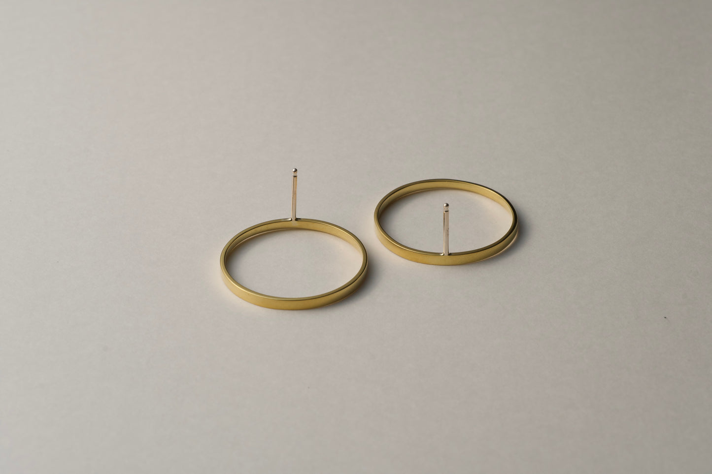 Brass ring earrings / one
