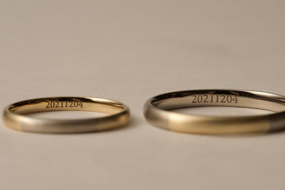 ２つの指輪に「20211204」の刻印