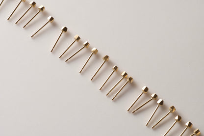 18k gold pebble earrings / one