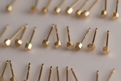 18k gold pebble earrings / one