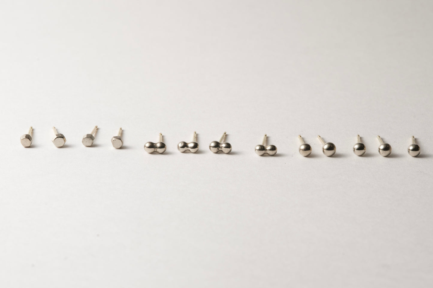 18k gold pebble earrings / one