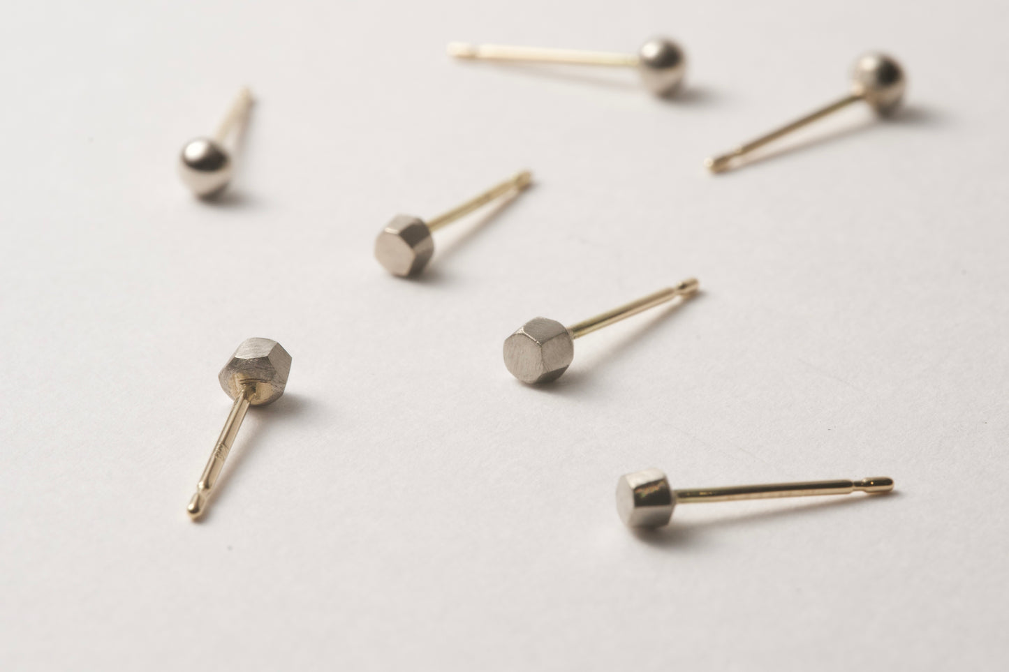18k gold pebble earrings / one