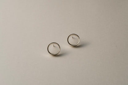 Small silver ring earring / one