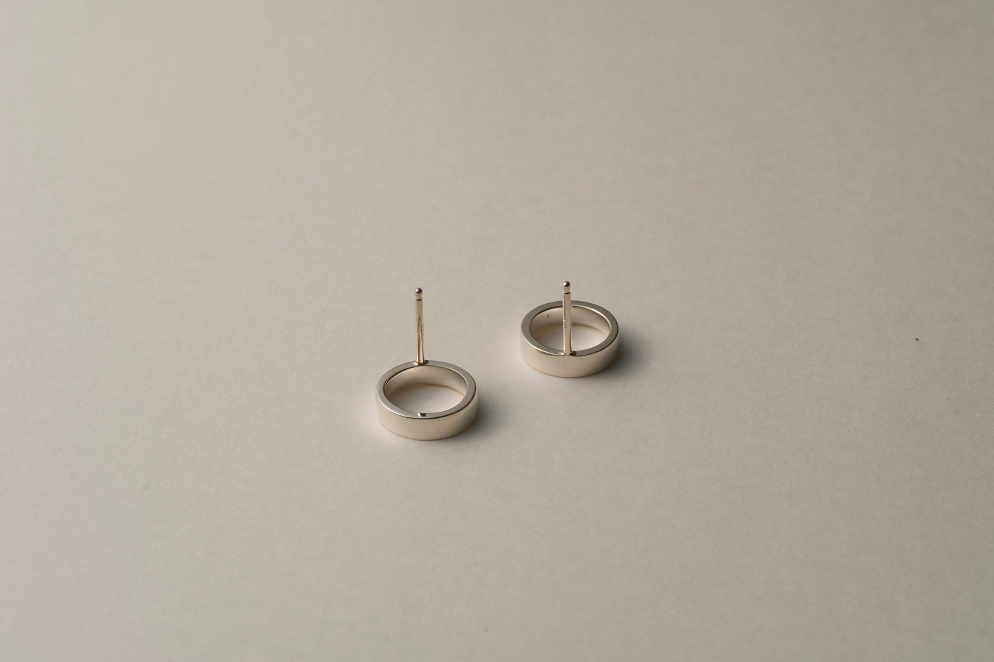 Small silver ring earring / one