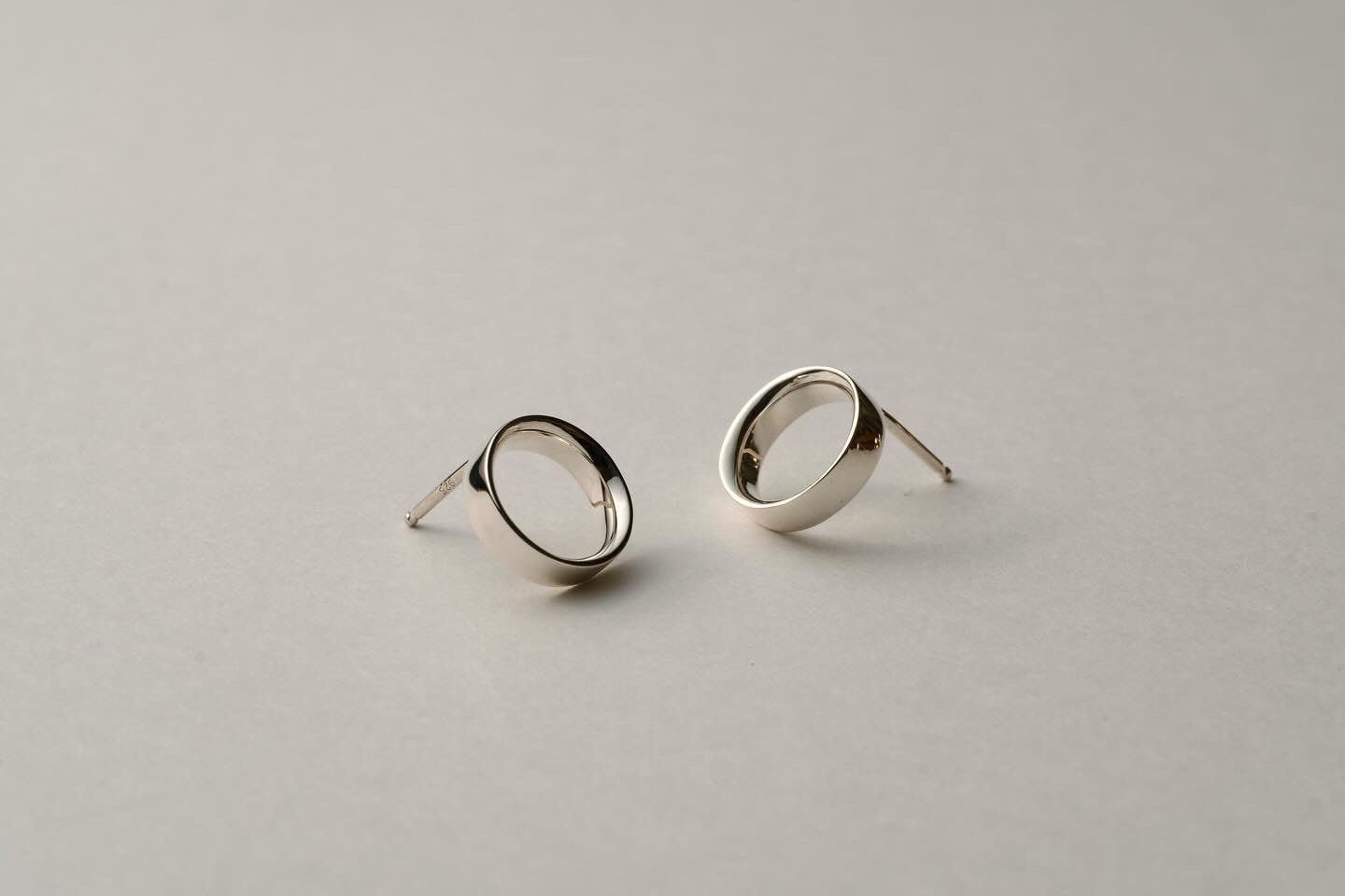 Small silver ring earring / one