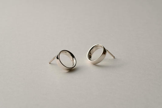 Small silver ring earring / one
